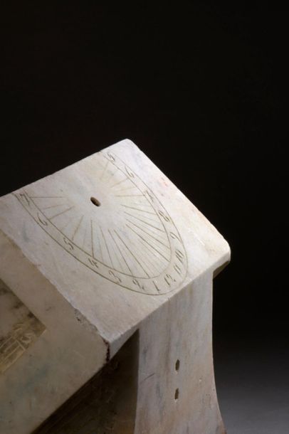 Polyhedral garden sundial in white marble.
Equatorial...