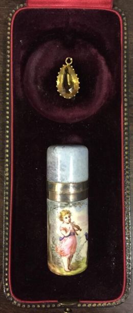 A small flask decorated with a flute-playing...