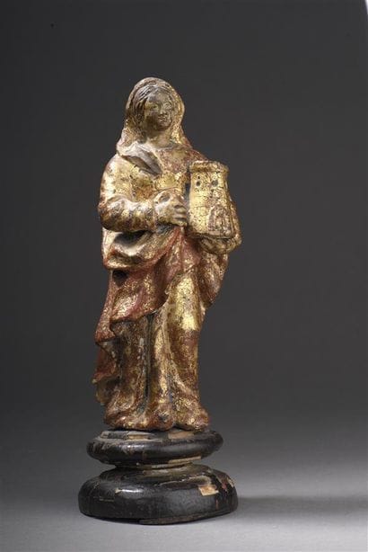 Statuette en terre cuite dorée représentant...
