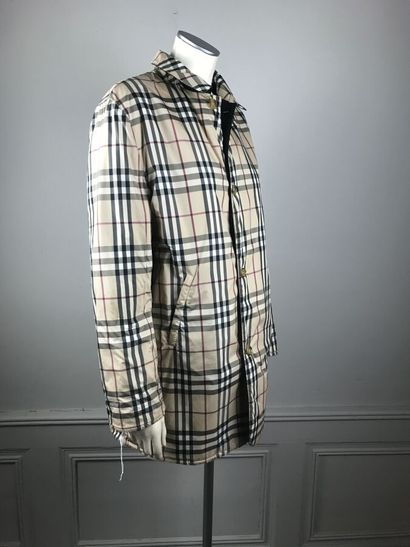 BURBERRY

Veste parka réversible en nylon...