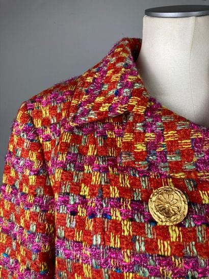 CHRISTIAN LACROIX

Veste courte en tweed...