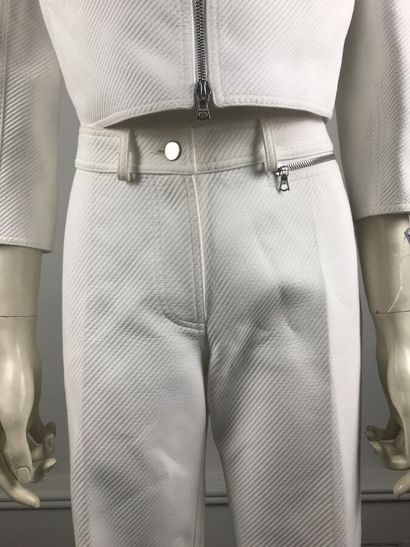 COURREGES

Ensemble en coton blanc surpiqué...