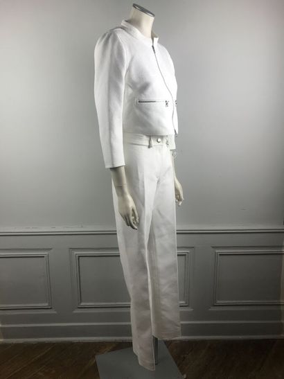 COURREGES

Ensemble en coton blanc surpiqué...