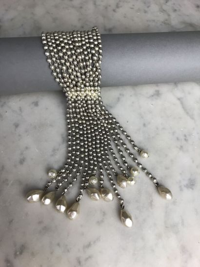 PATRICK RETIF

Bracelet à quinze rangs de...