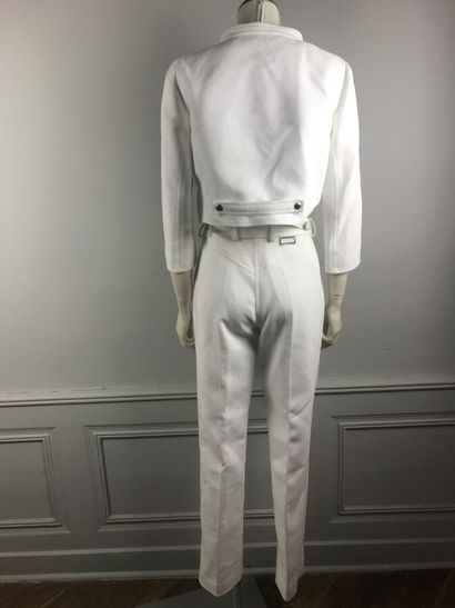 COURREGES

Ensemble en coton blanc surpiqué...