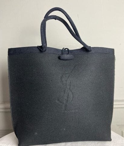 YVES SAINT-LAURENT

Black felt tote bag with...