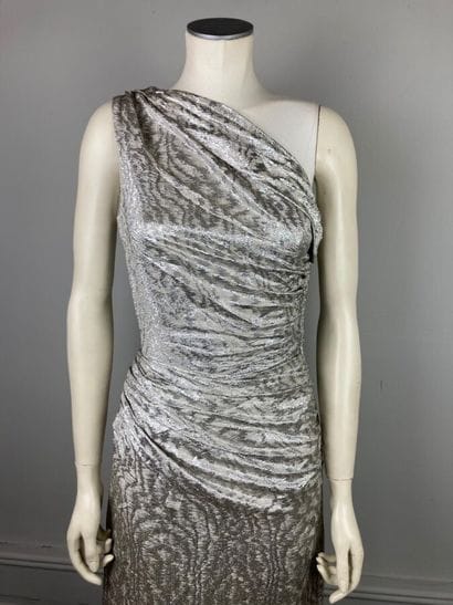 VICKY TIEL 

Circa 1978

Robe longue en lamé...