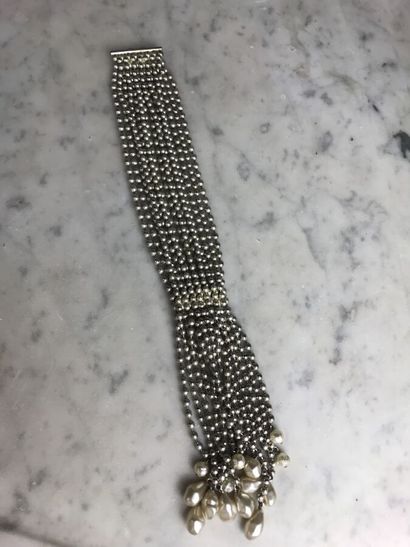 PATRICK RETIF

Bracelet à quinze rangs de...