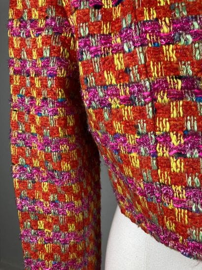 CHRISTIAN LACROIX

Veste courte en tweed...
