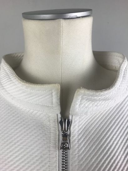 COURREGES

Ensemble en coton blanc surpiqué...