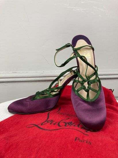 CHRISTIAN LOUBOUTIN

Pair of purple satin...