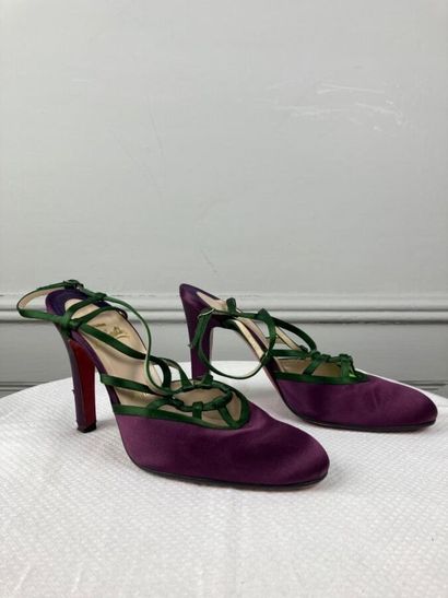 CHRISTIAN LOUBOUTIN

Pair of purple satin...