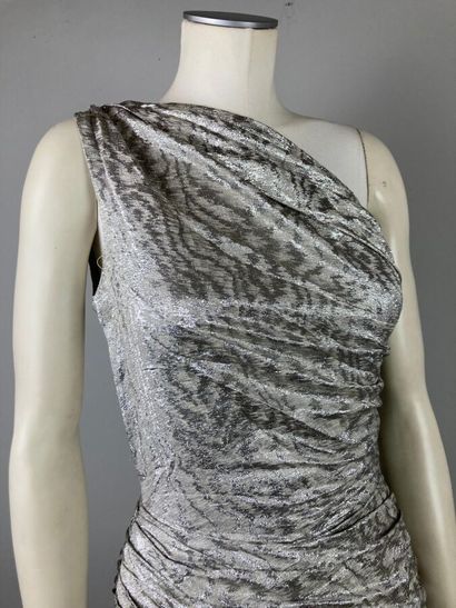 VICKY TIEL 

Circa 1978

Robe longue en lamé...