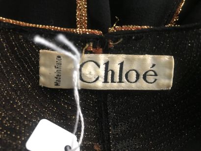 CHLOE

Ensemble en crêpe de soie noir gansé...