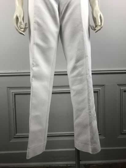 COURREGES

Ensemble en coton blanc surpiqué...