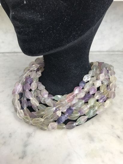 CESAREE

Collier à neuf rangs de perles tournées...