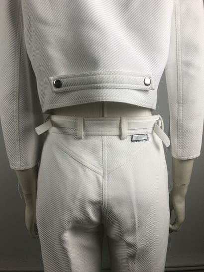 COURREGES

Ensemble en coton blanc surpiqué...