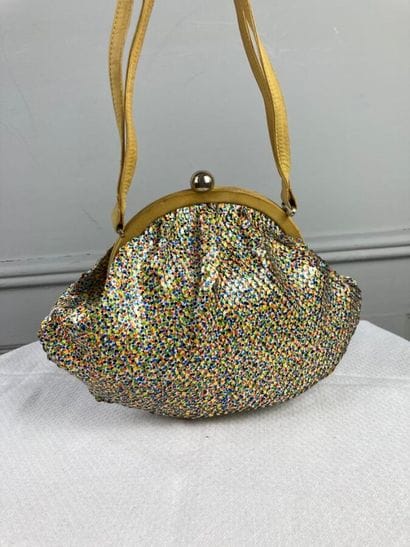 PHILIPPE MODEL

Petit sac bourse en sequins...
