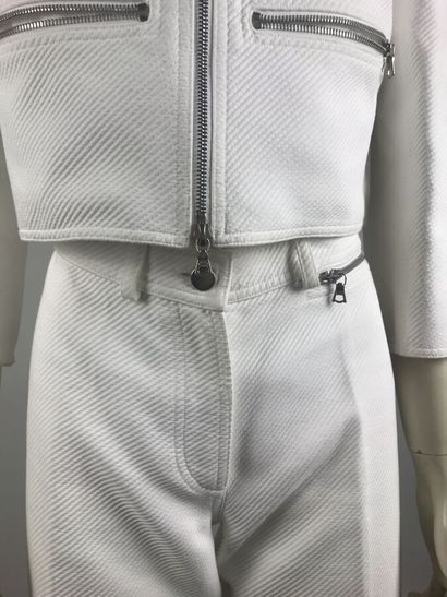 COURREGES

Ensemble en coton blanc surpiqué...