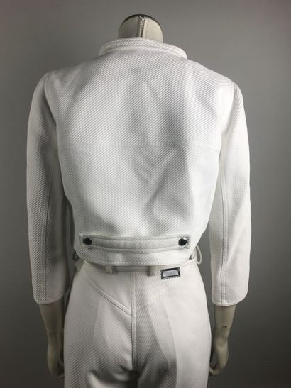 COURREGES

Ensemble en coton blanc surpiqué...