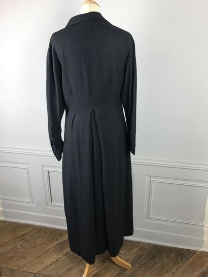 SYBILLA pour GIBO

Robe longue noire en trompe...