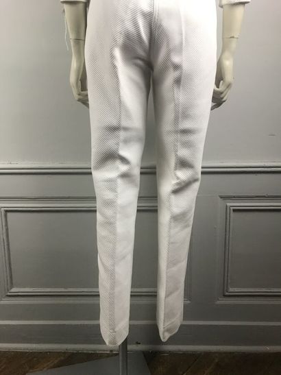 COURREGES

Ensemble en coton blanc surpiqué...