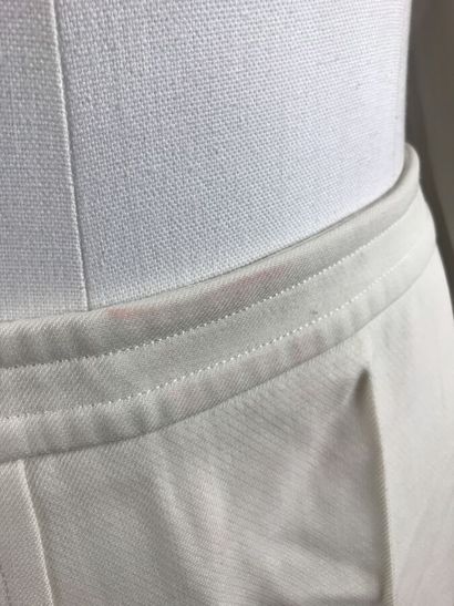 COURREGES

Ensemble gabardine de laine écrue...