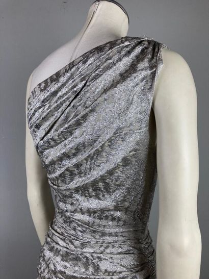 VICKY TIEL 

Circa 1978

Robe longue en lamé...