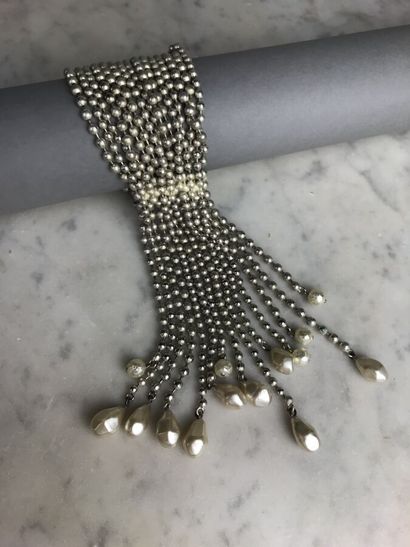 PATRICK RETIF

Bracelet à quinze rangs de...