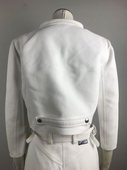COURREGES

Ensemble en coton blanc surpiqué...