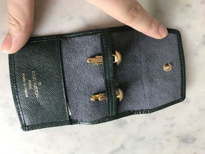 LOUIS VUITTON

Lot including a pair of gilded...