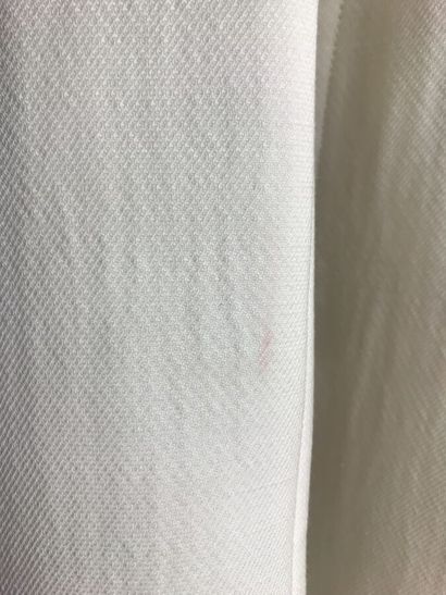 COURREGES

Ensemble gabardine de laine écrue...