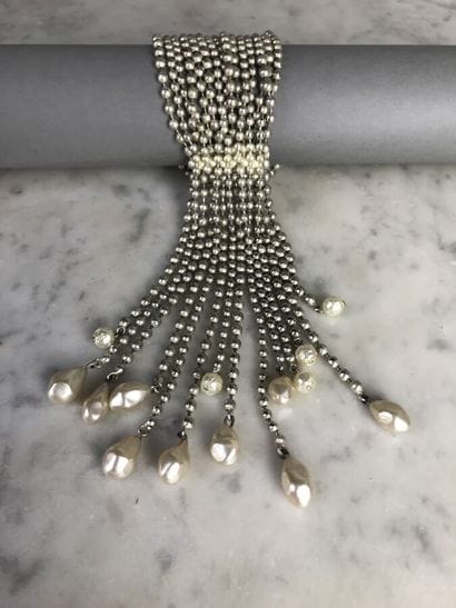 PATRICK RETIF

Bracelet à quinze rangs de...