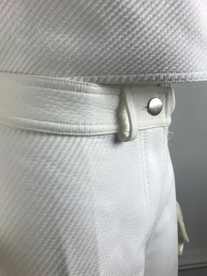 COURREGES

Ensemble en coton blanc surpiqué...