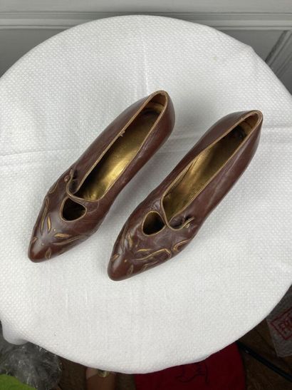 STEPHANE KELIAN

Pair of black leather shoes...