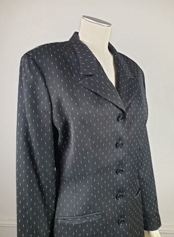 NORMA KAMALI

Veste noire à motif blanc,...
