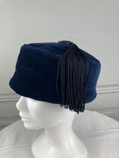 STEPHEN JONES

Navy velvet tarbouche hat...