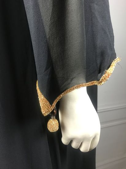 CHLOE

Ensemble en crêpe de soie noir gansé...