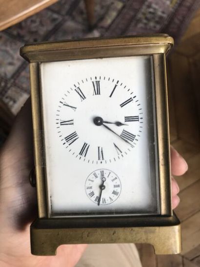 Pendulette d'officier en laiton

H. 11 cm

État...