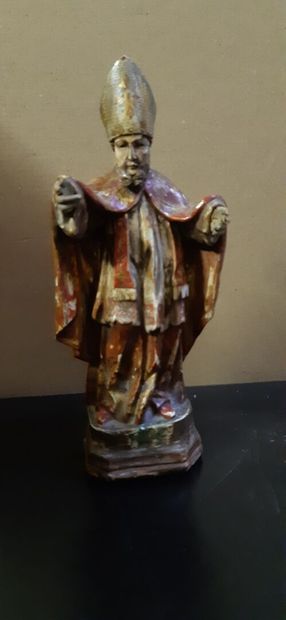 Petit évêque en bois sculpté



XVIIIe -...