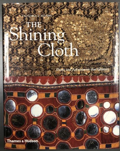 A collection of five books on fabrics and...