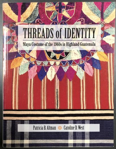 A collection of five books on fabrics and...