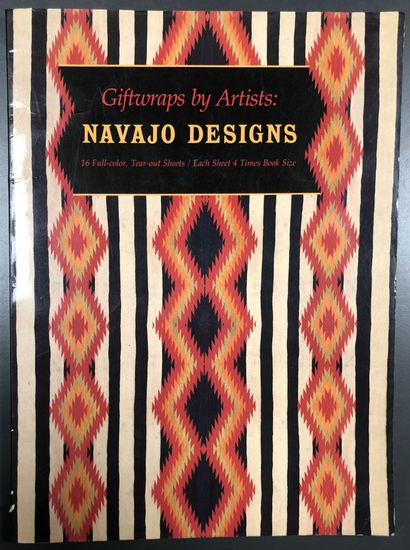A collection of five books on fabrics and...