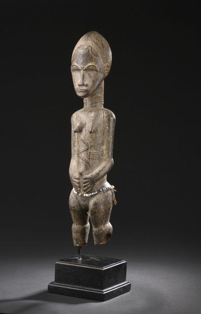 *Baule statue, Ivory Coast 
Wood, beads,...