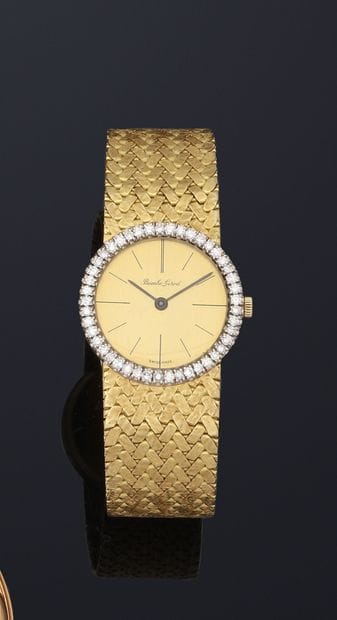 BUECHE-GIROD
Montre bracelet de dame en or...