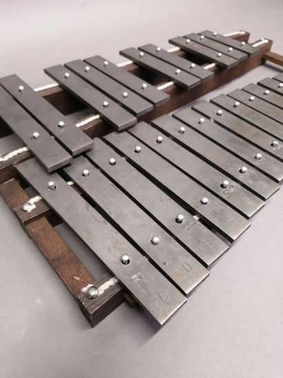 Metallophone made circa 1930 on wooden stand....