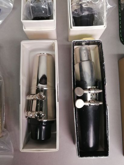Set of new saxophone mouthpieces including:
1...