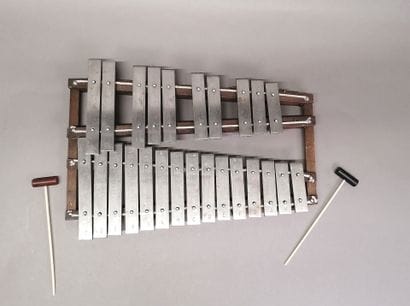 Metallophone made circa 1930 on wooden stand....