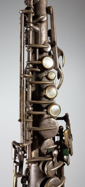 Silver-plated metal soprano saxophone with...