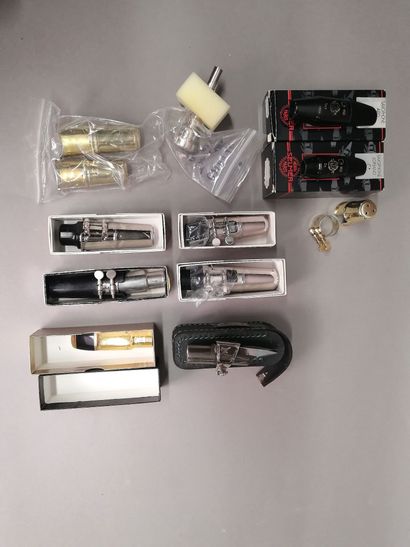 Set of new saxophone mouthpieces including:
1...